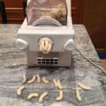 pasta machine extrudes pasta