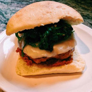 sausage burgers with garlicky spinach