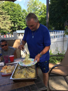 ralph serving his pasta