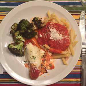sheet pan sausage parmesan with garlicky broccoli